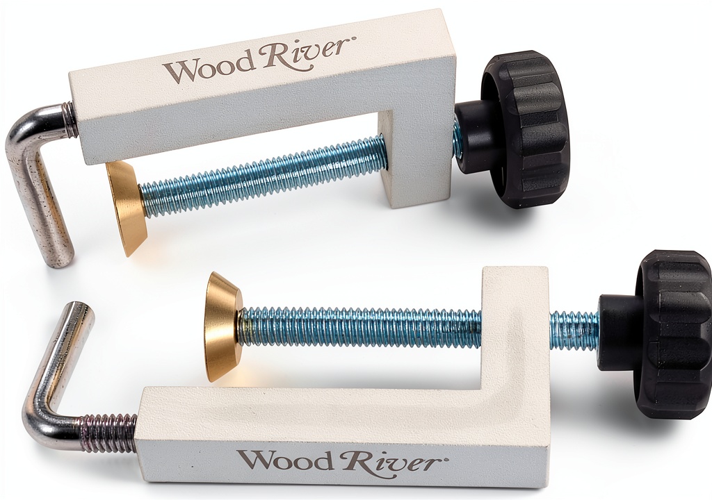 'WOODRIVER Edge Clamp in use on a wooden fence edge'